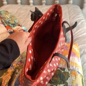 Coach red print bag. Normal wear and tear.